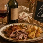 Quel vin avec un confit de canard : rouge Cahors, confit et verre de vin